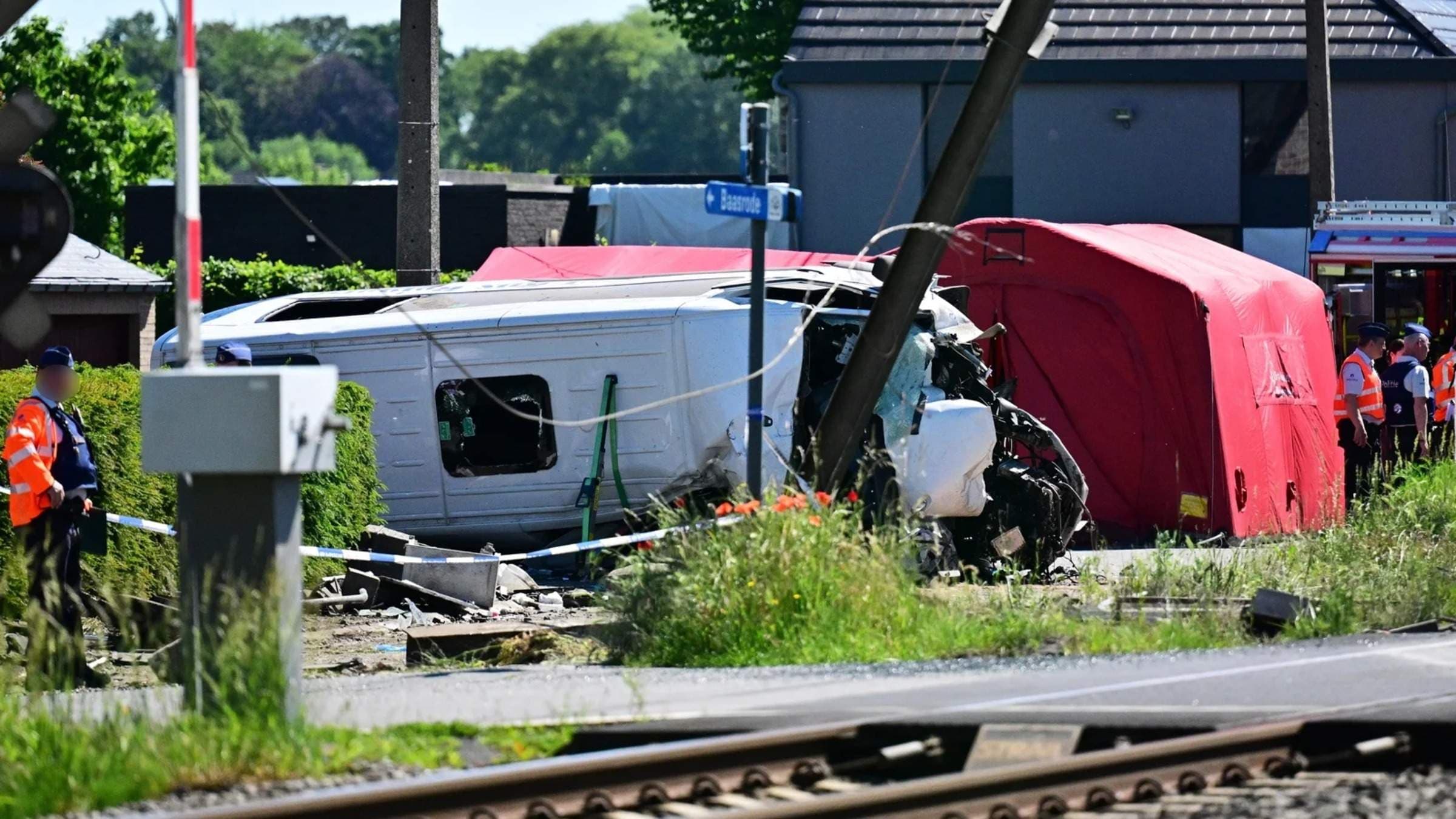 Buggenhout Tragedy: Four Dead After School Minibus Hits Train at Belgian Level Crossing