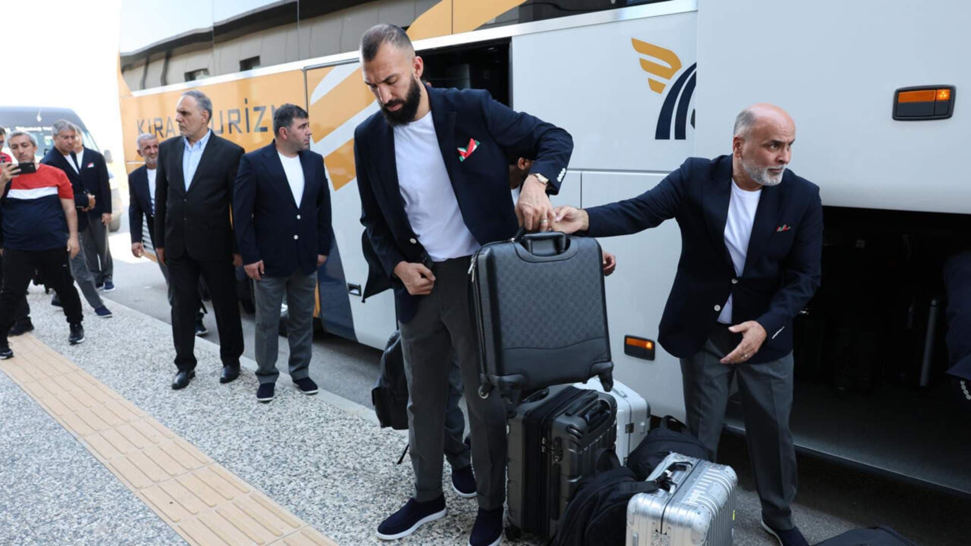 Visa Row: Iran Players in, Staff out